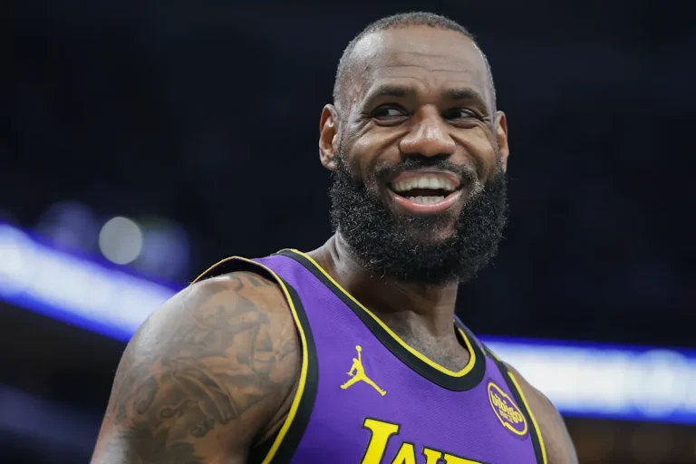 LeBron James posts triple-double while tying Robert Parish's NBA games played record